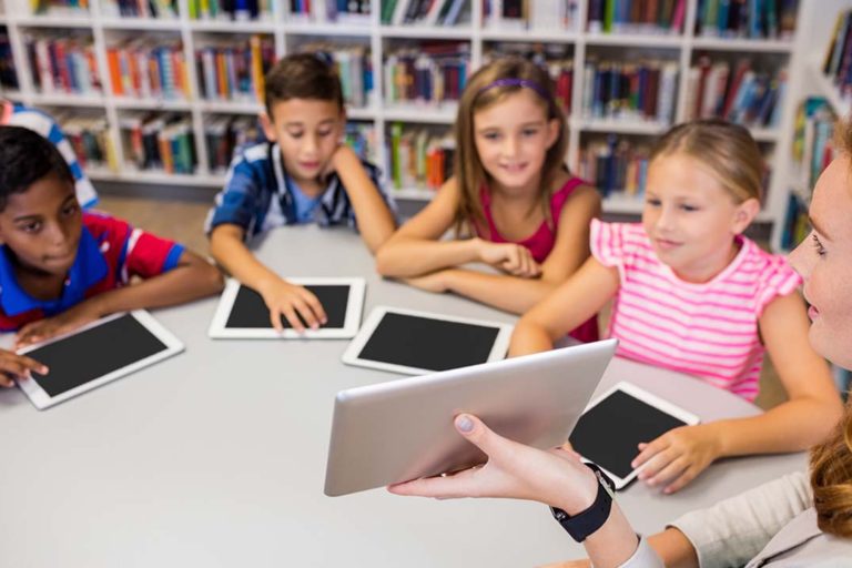 children with their computer tablets